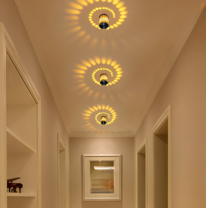 Spiralume – Zylindrische LED-Wandleuchte mit spiralförmigem Lichteffekt